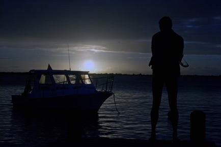 man boat sunset.jpg